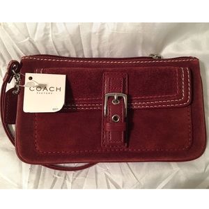 Wine (bordeaux) colored suede COACH wristlet